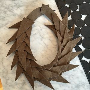 Vacide Erda Zimic felt statement necklace.